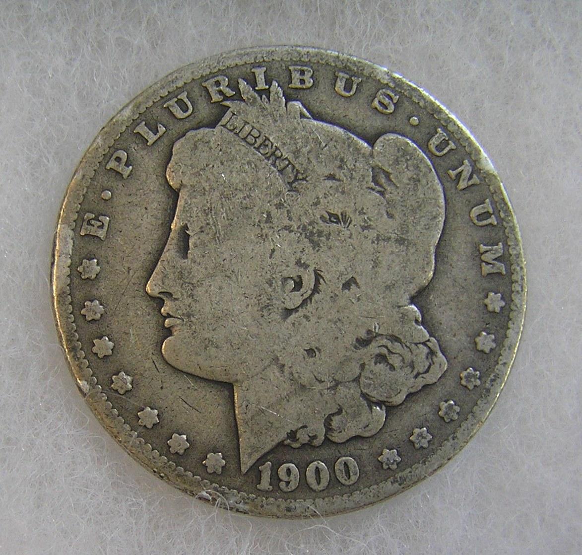 1900-O Morgan silver dollar in fair condition