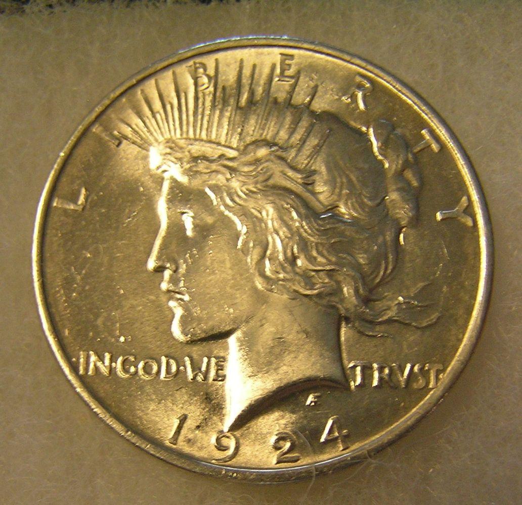 1924 Peace silver dollar in AU condition