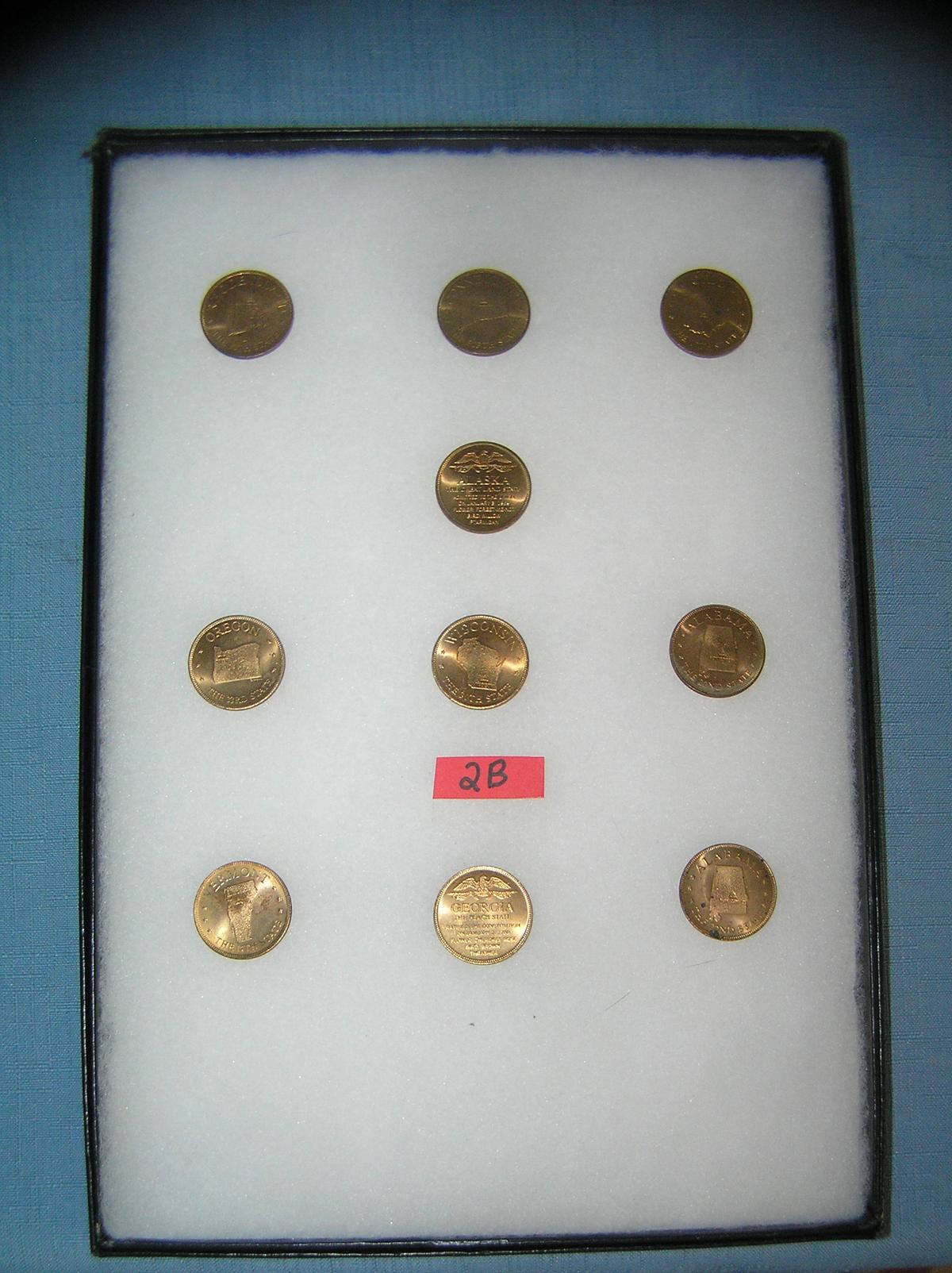 Collection of solid brass US state commemoratives