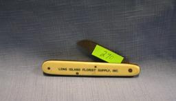 Antique celluloid advertising pocket knife