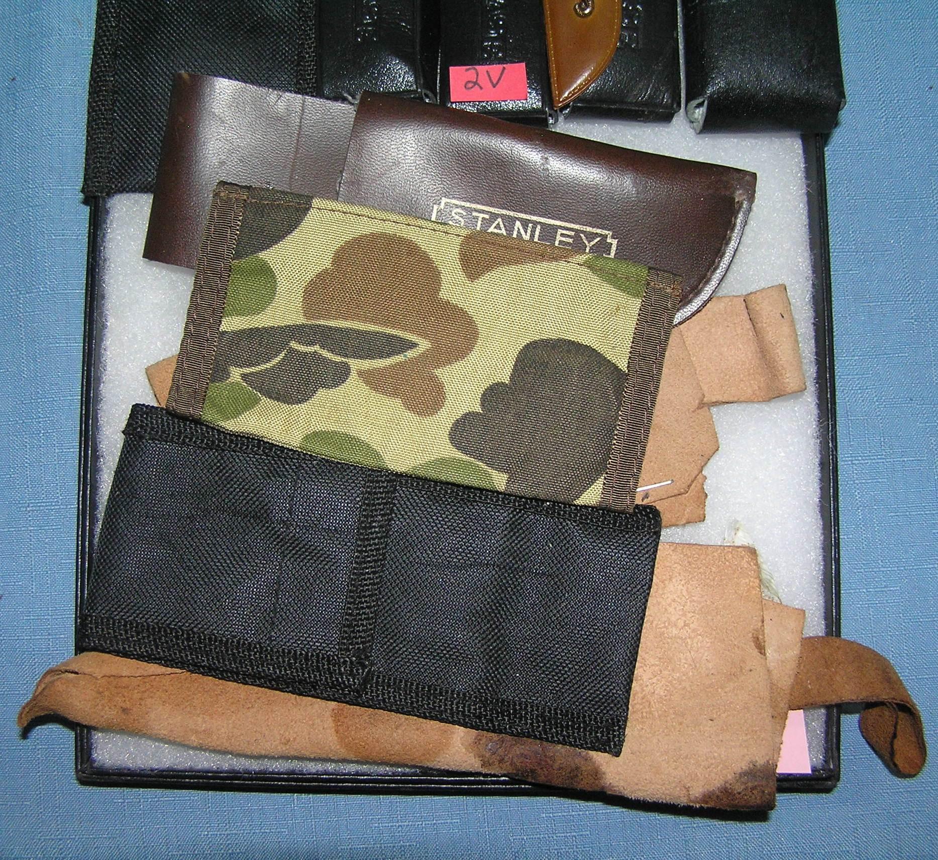 Group of knife cases and sheaths