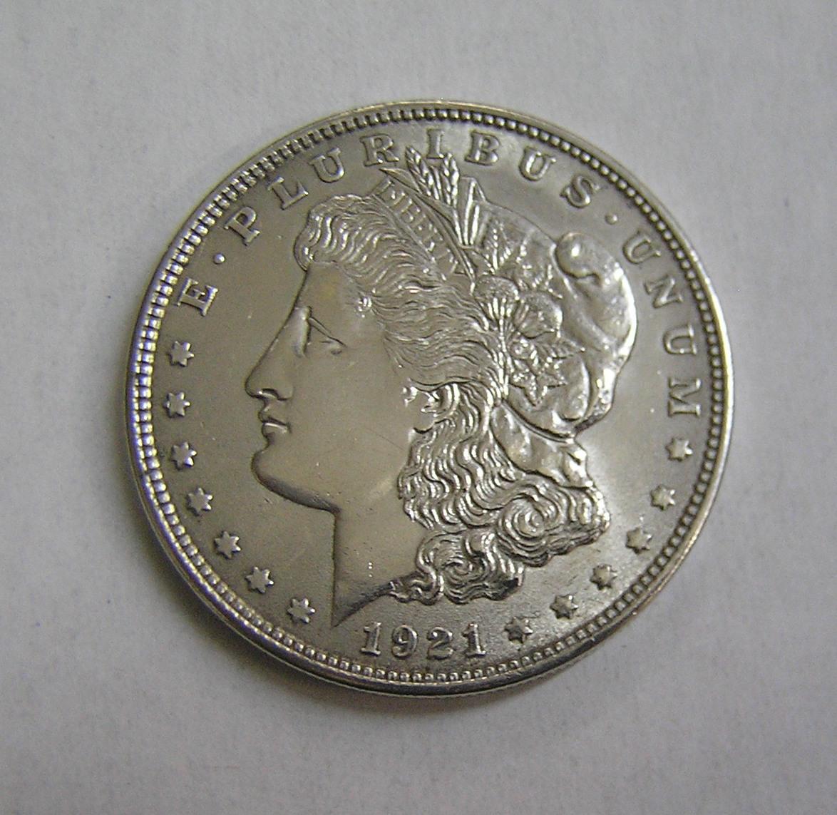 1921 Morgan silver dollar in AU condition