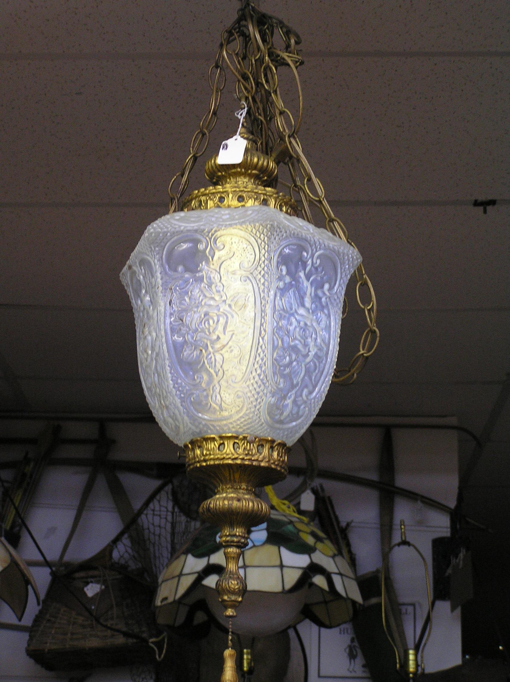 Vintage chandelier with floral decorated glass centerpiece