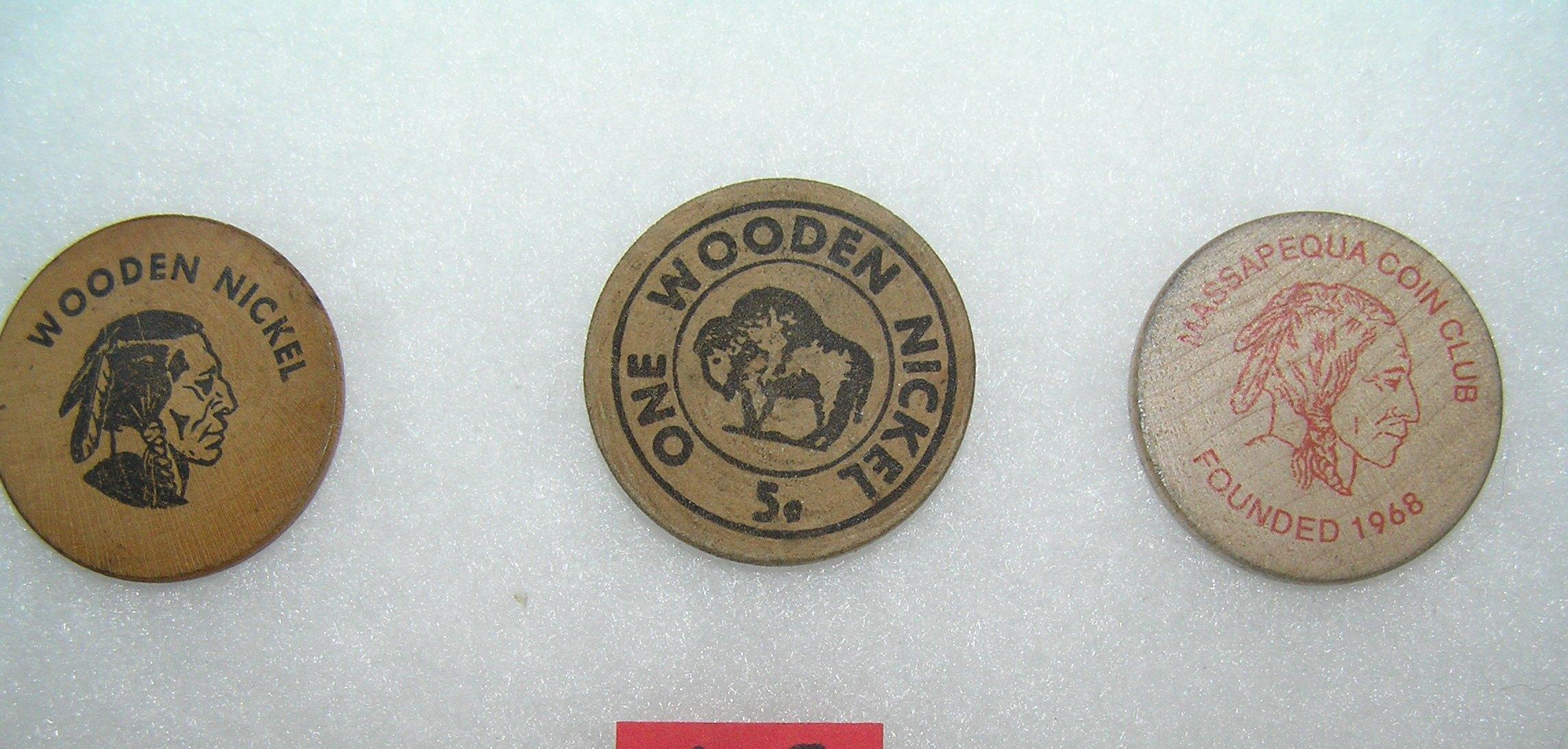 Group of 3 wood advertising nickles