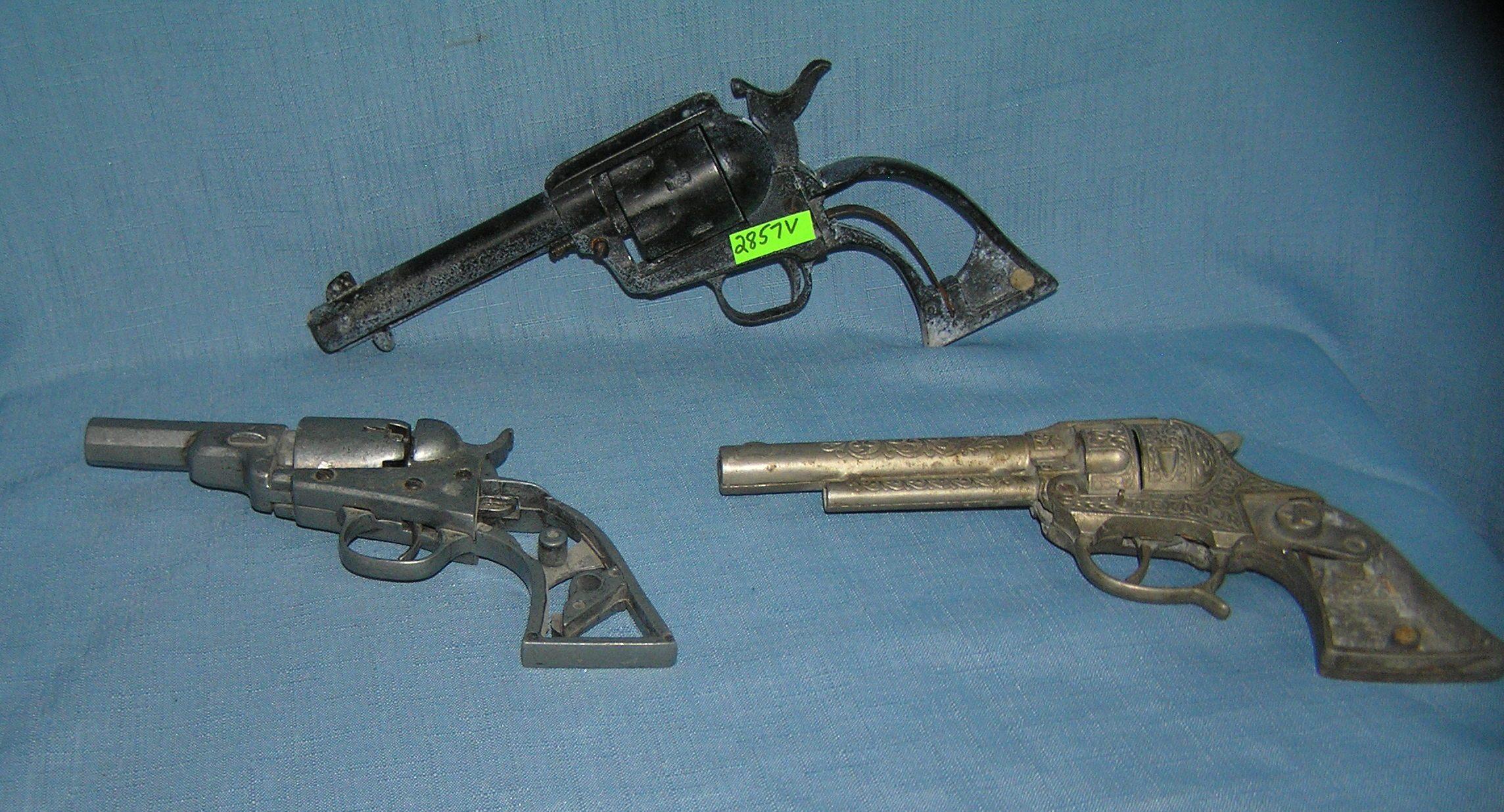 Group of 3 early Heavy cast Metal Toy Guns