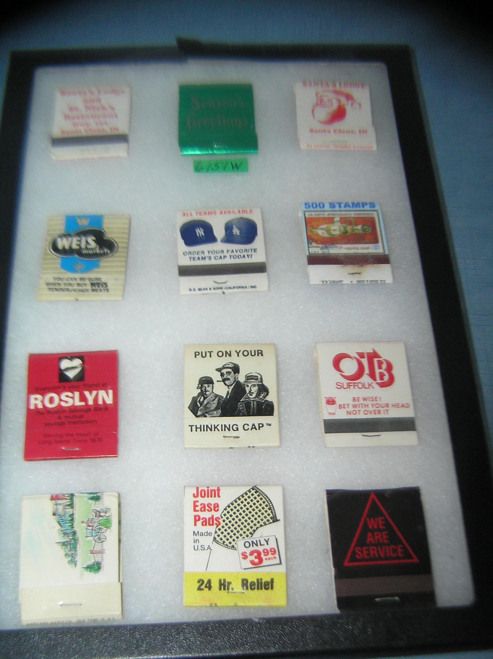 Collection of vintage matchbooks with advertising