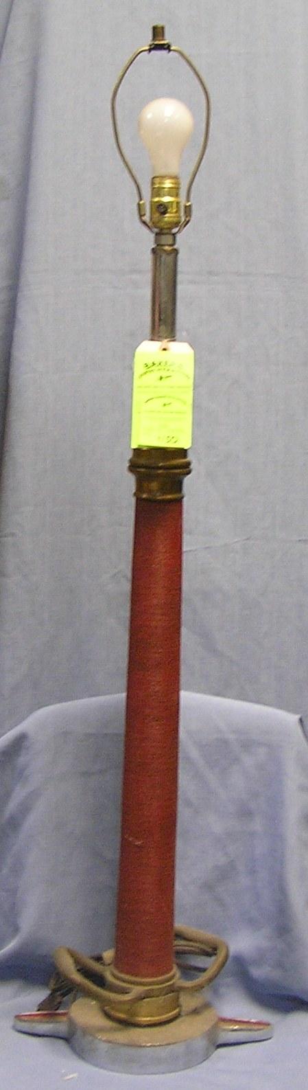 Large antique fire nozzle lamp