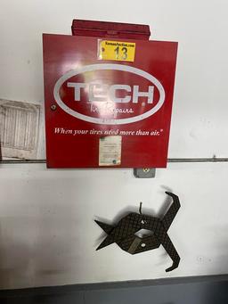 BUYER TO REMOVE FROM WALL. TIRE REPAIR PARTS/TOOLS AND CABINET
