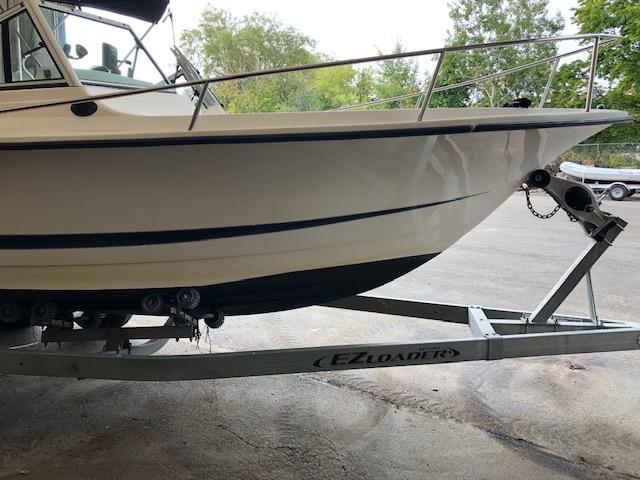 *SEE NOTE ON REPAIR BELOW. 1997 HYDRA-SPORT OCEAN 23’ BOWRIDER, HULL # HSX2J107H697, JOHNSON 140HP