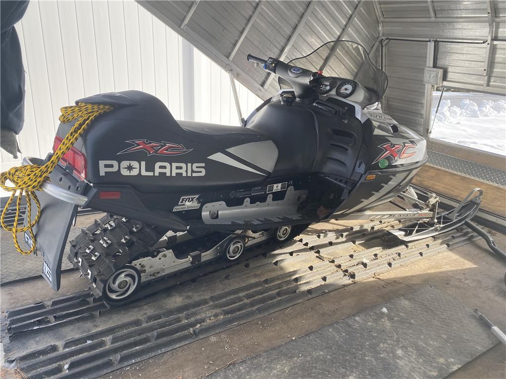 2004 POLARIS XC SNOWMOBILE W/ LIBERTY 600cc ENGINE, MILES 1,579, S/N: SN1NP6ES34C412381