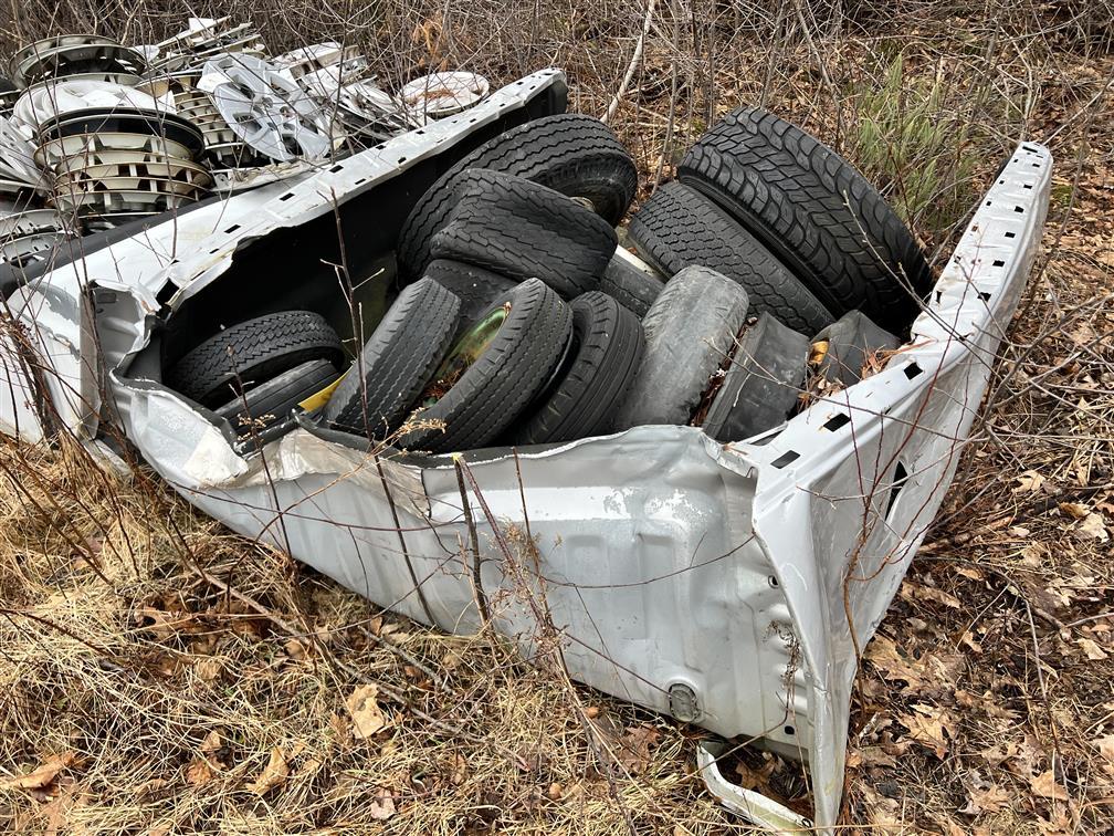 TRUCK BED & CONTENTS: MISC. TRUCK & TRAILER TIRES, SOME WITH RIMS