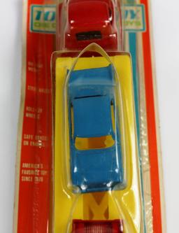 NEW, IN THE PACKAGE TOOTSIETOY CAR HAULER DIECAST