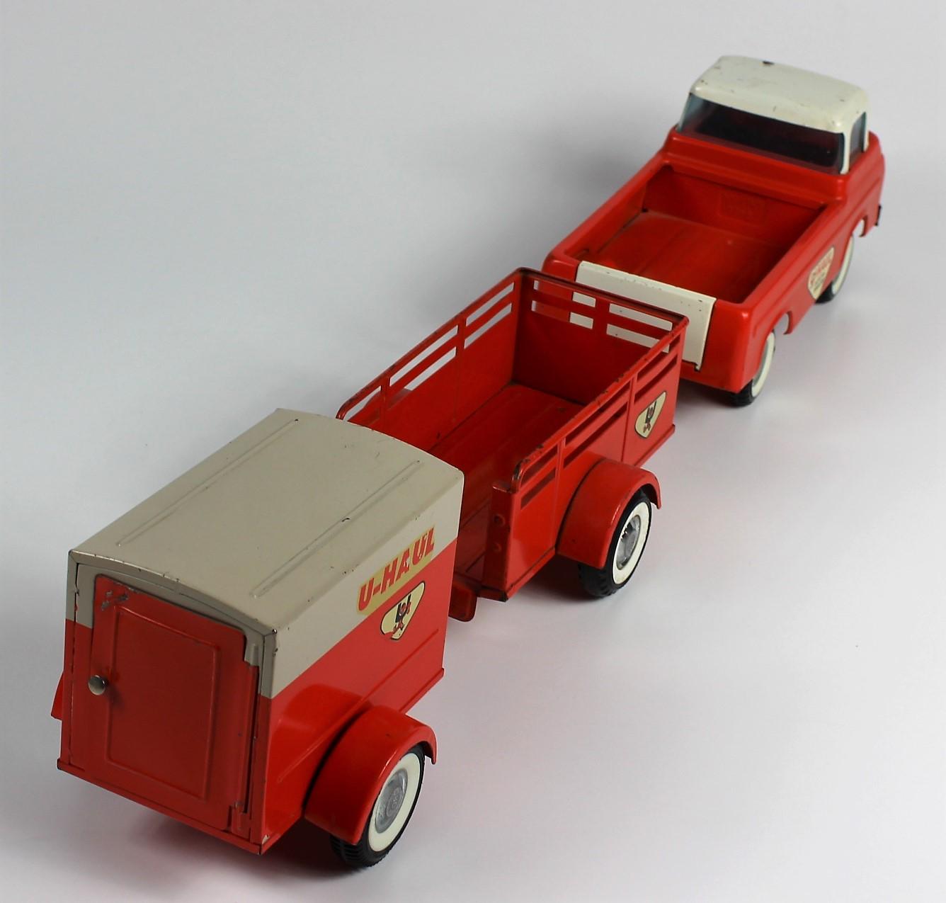 VINTAGE NYLINT FORD ECONOLINE UHAUL TRUCK AND 2 TRAILERS