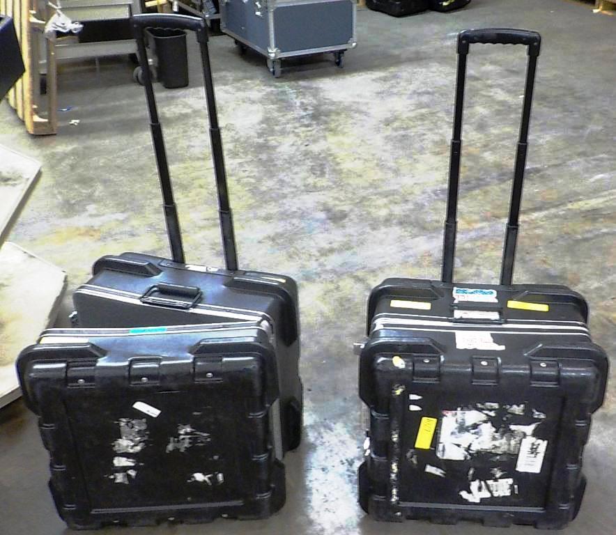 2 BLACK ROLLING EQUIPMENT CASES WITH RETRACTABLE HANDLES