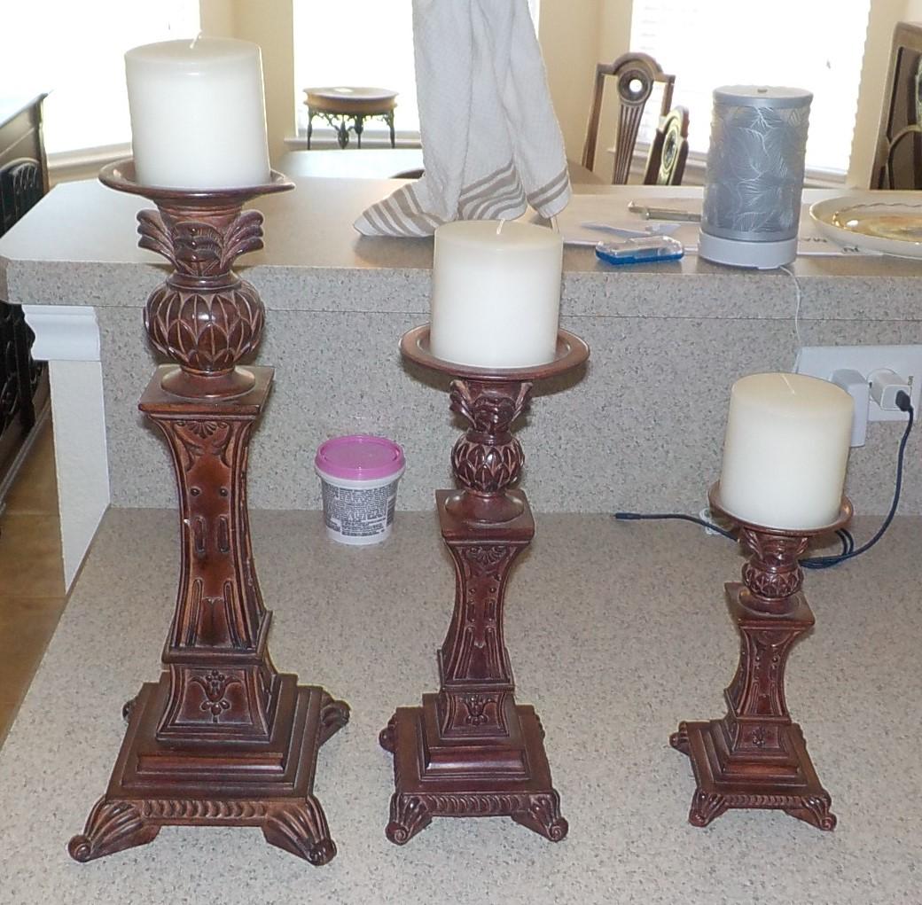LOT OF 3 GRADUATED CANDLE STANDS WITH PILLAR CANDLES