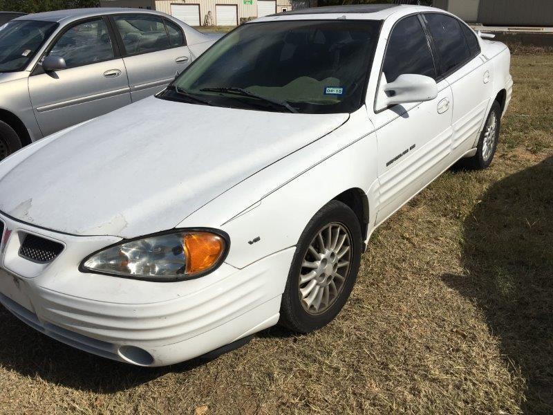 *1999 White Pontiac Grand AM