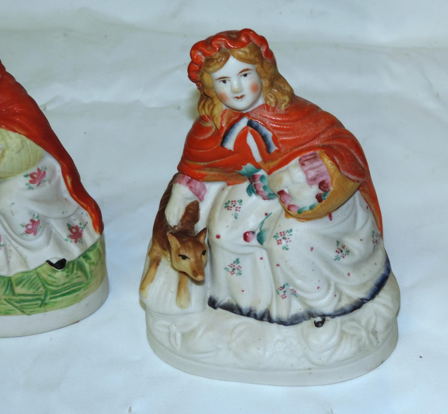 Lot of (8) Early Porcelain and Pottery Little Red Riding Hood Figures