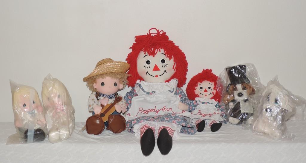 Lot of Precious Moments and Raggedy Ann Dolls