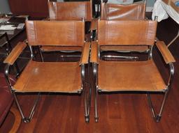 Wonderful Modern Chrome Base Modern Table and (4) Strap Leather and Chrome Chairs