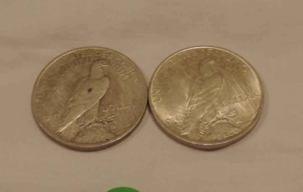 (2) Peace Silver Dollars