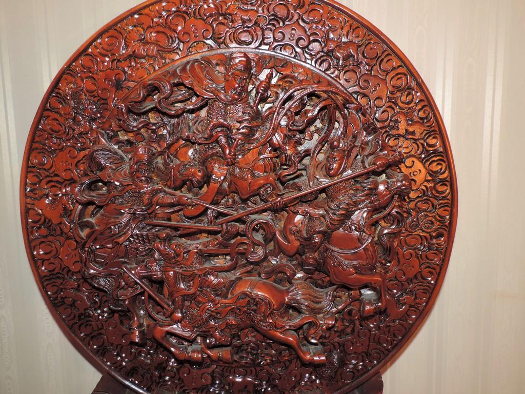 Hand-carved wooden oriental fireplace screen