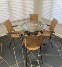 Round Glass-Top Table With 4 Woven Armed Chairs