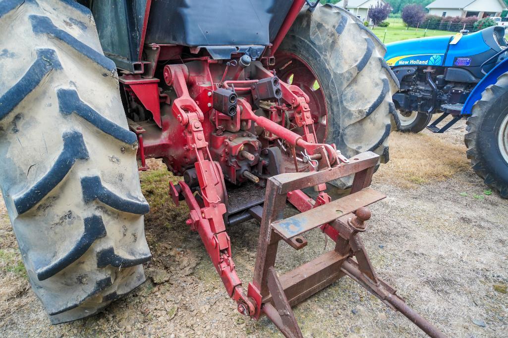 1086 IH Tractor and Allied Loader w/Hay Fork