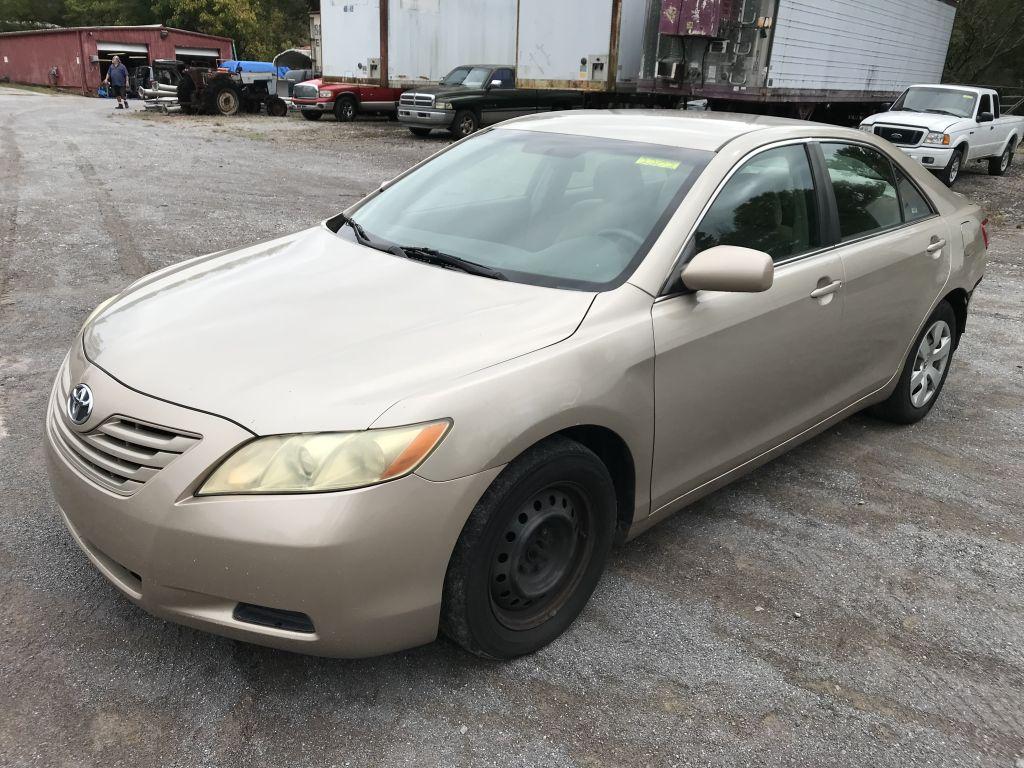 2008 Toyota Camry LE gold 4-door sedan; 210612mi; 2.4L 4 cylinder gas engine; automatic transmission