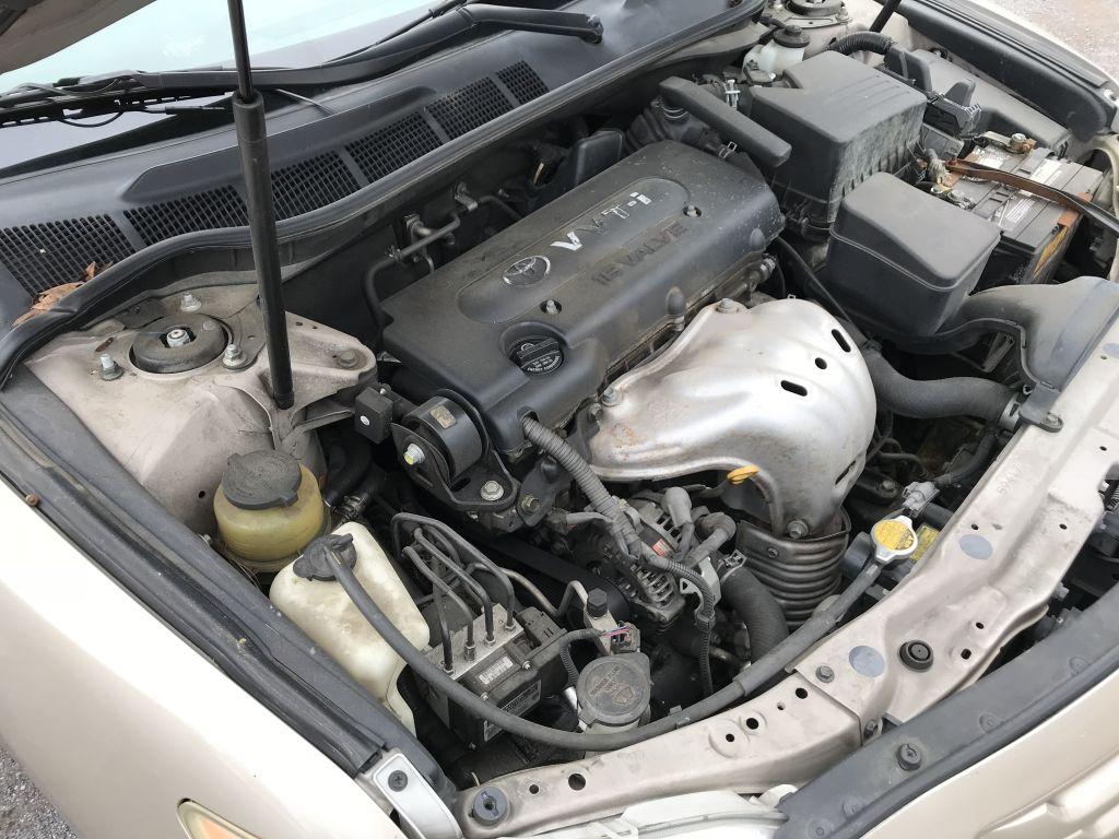 2008 Toyota Camry LE gold 4-door sedan; 210612mi; 2.4L 4 cylinder gas engine; automatic transmission