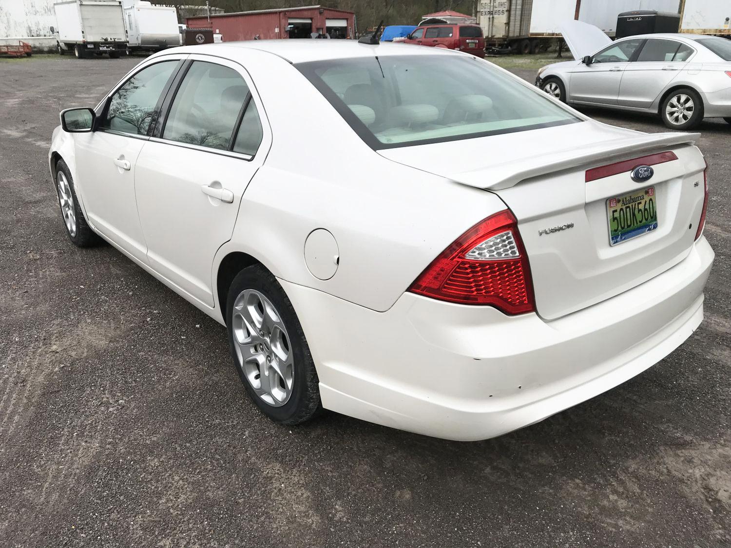 2010 Ford Fusion SE 4-door pearl white sedan, 158608mi, 2.5 liter 4 cylinder gas engine, automatic t