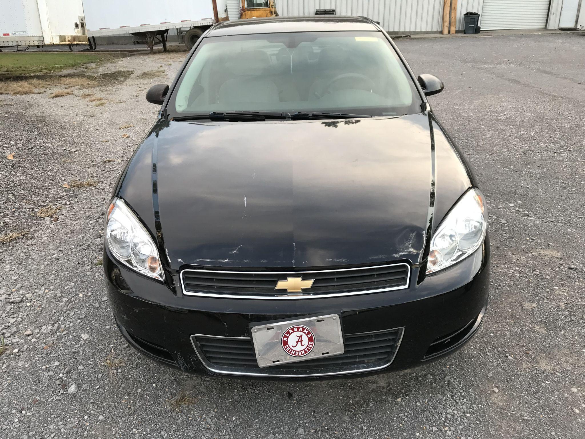 2006 Chevrolet Impala LS 4-door black sedan, 142239mi, 3.5 liter V6 gas engine, automatic transmissi