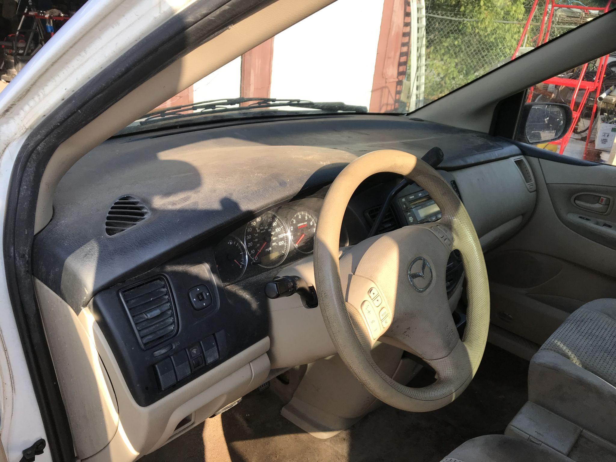 2004 Mazda MPV LX 4-door white wagon, 200820mi, 3.0 liter V6 gas engine, automatic transmission, air