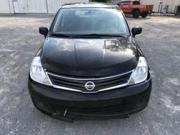 2012 Nissan Versa 4-door black hatchback, 139584mi, 1.8 liter 4 cylinder gas engine, automatic trans