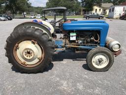 Ford model 2000 tractor, converted to propane, showing 1294hrs, 4 speed, draw bar, 2 propane tanks, 