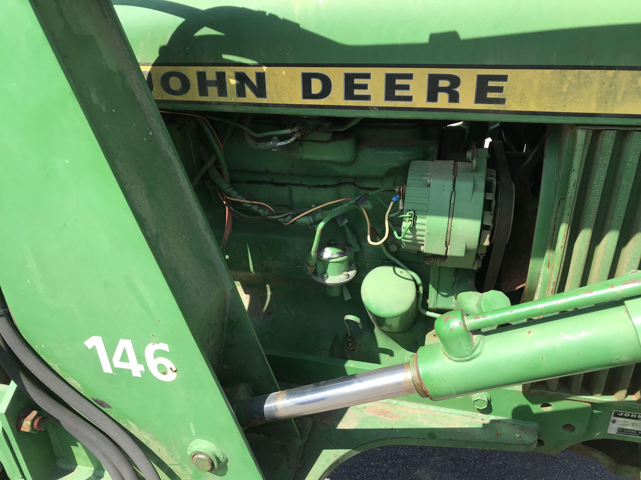 John Deere 2130 tractor with 146 front end leader, 8 speed lo-hi range, shows 1372hrs, needs seat, s