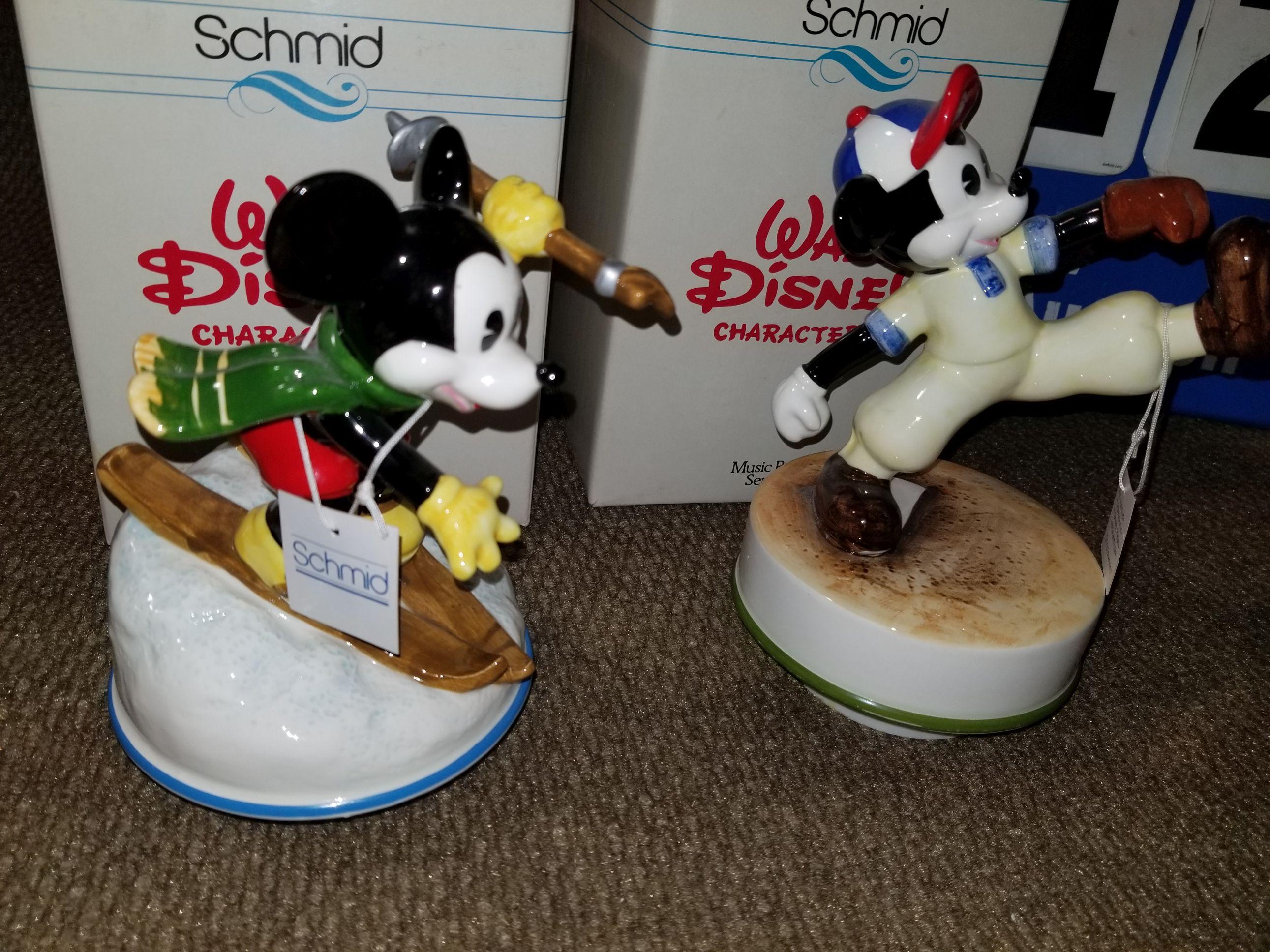 2 Schmid Disney music boxes.  One has been repairded