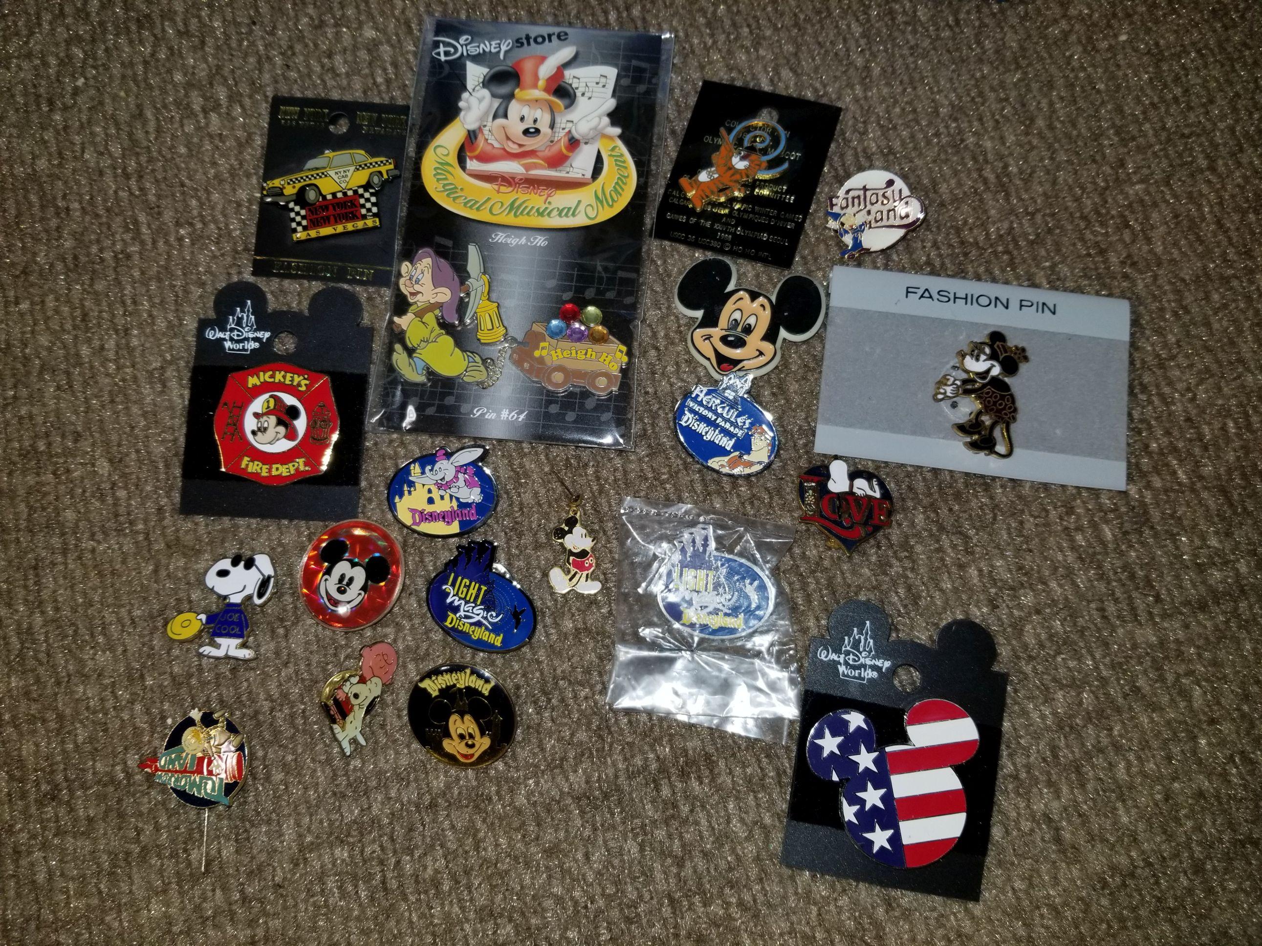 18 Disney pins: Mickey Pins, Snoopy, Fantasy Land, etc