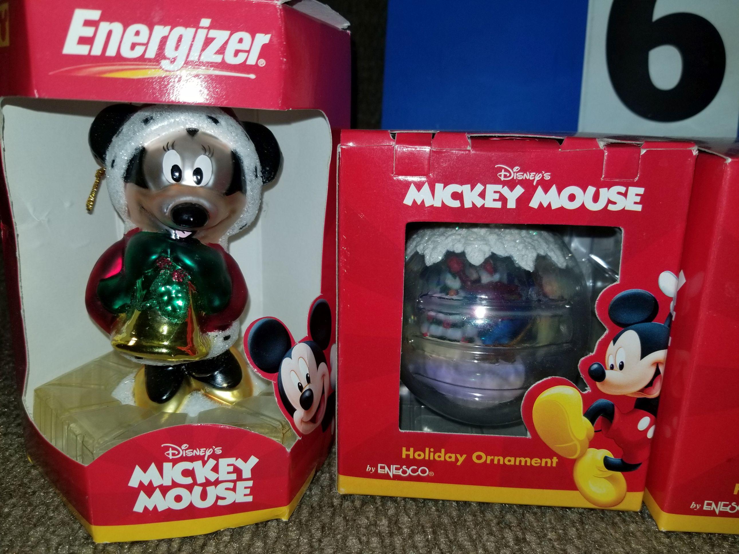 Four Disney Christmas ornaments