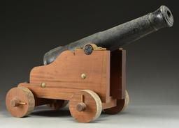 IRON CANNON ON NAVAL CARRIAGE BELONGING TO CAPTAIN