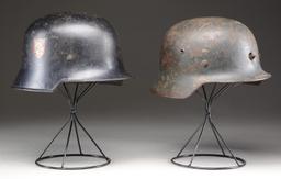 2 WWII GERMAN HELMETS.