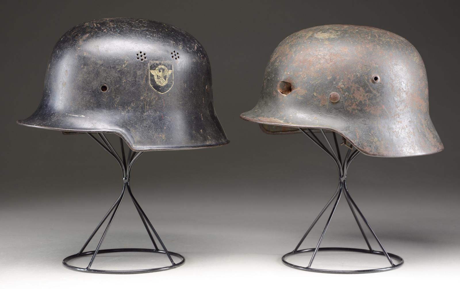 2 WWII GERMAN HELMETS.