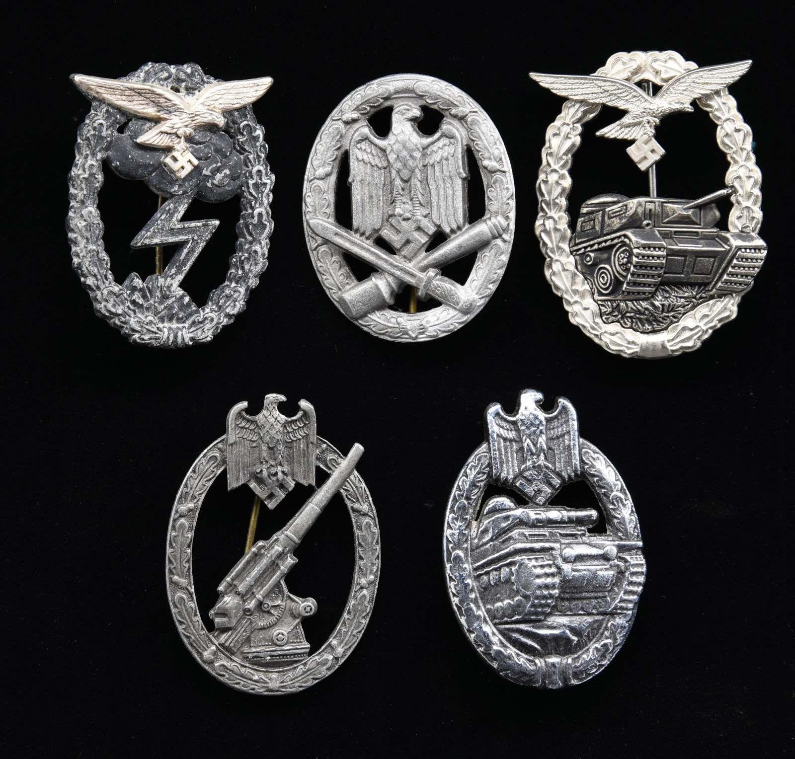 5 GERMAN WWII-STYLE REPRODUCTION BADGES.