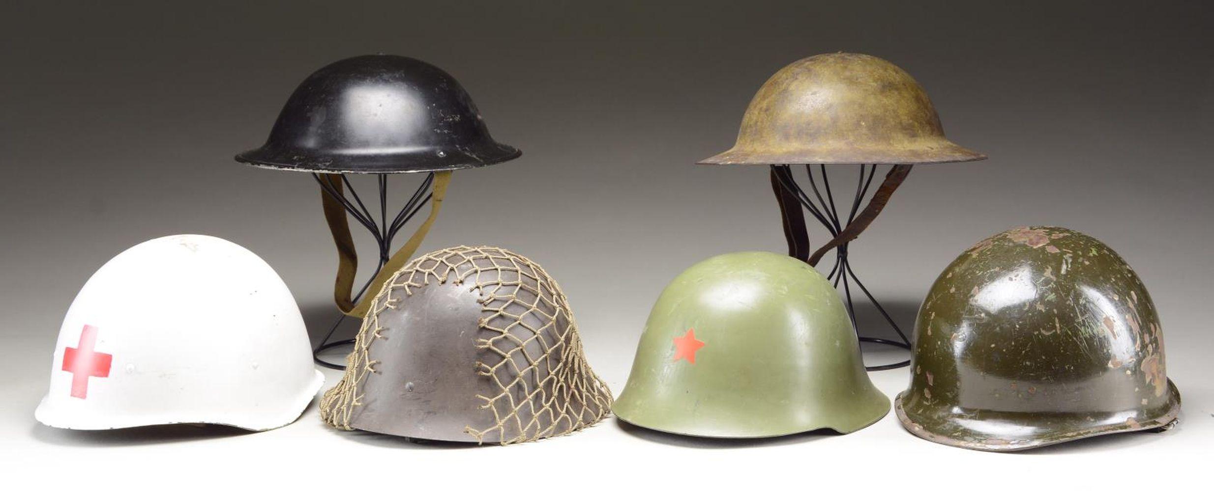 6 MILITARY HELMETS.