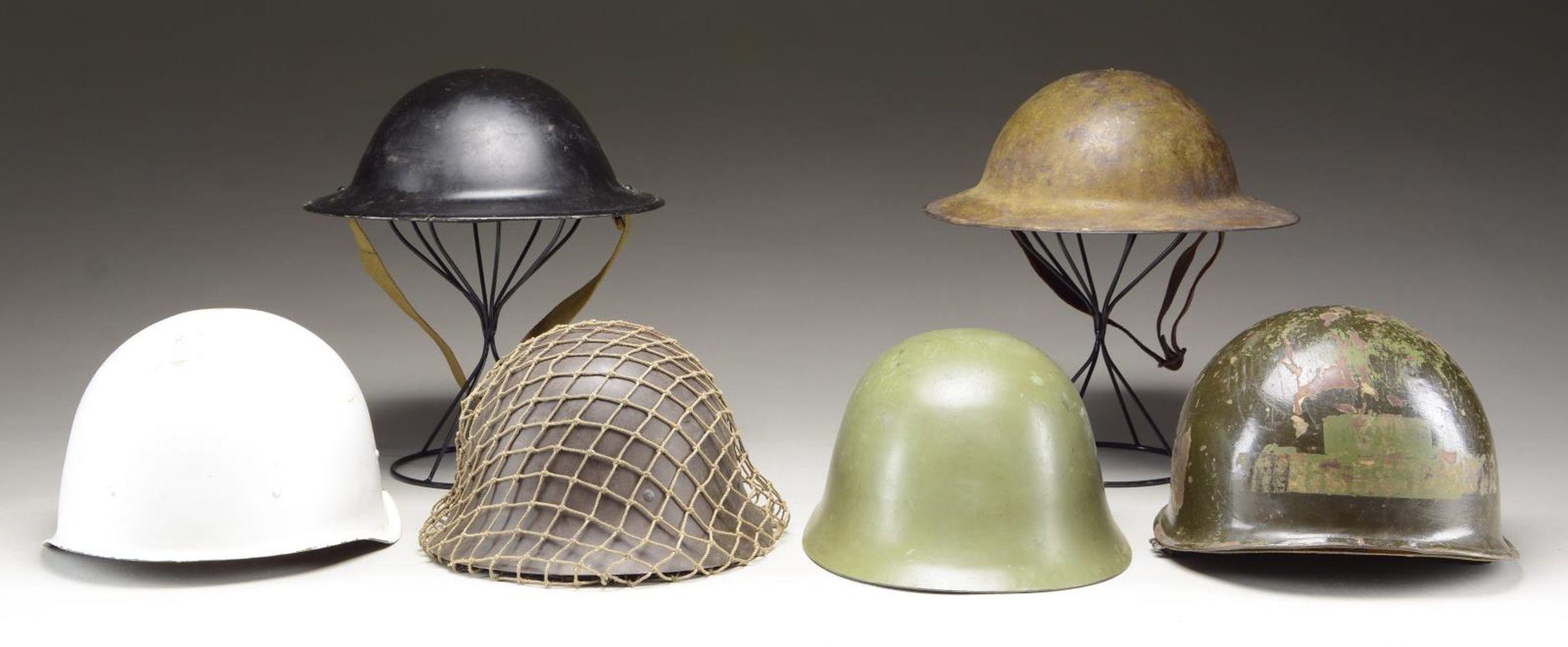 6 MILITARY HELMETS.