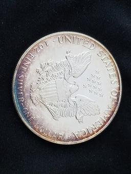 1987 1 oz. Silver American Eagle BU Nice Rainbow Toning