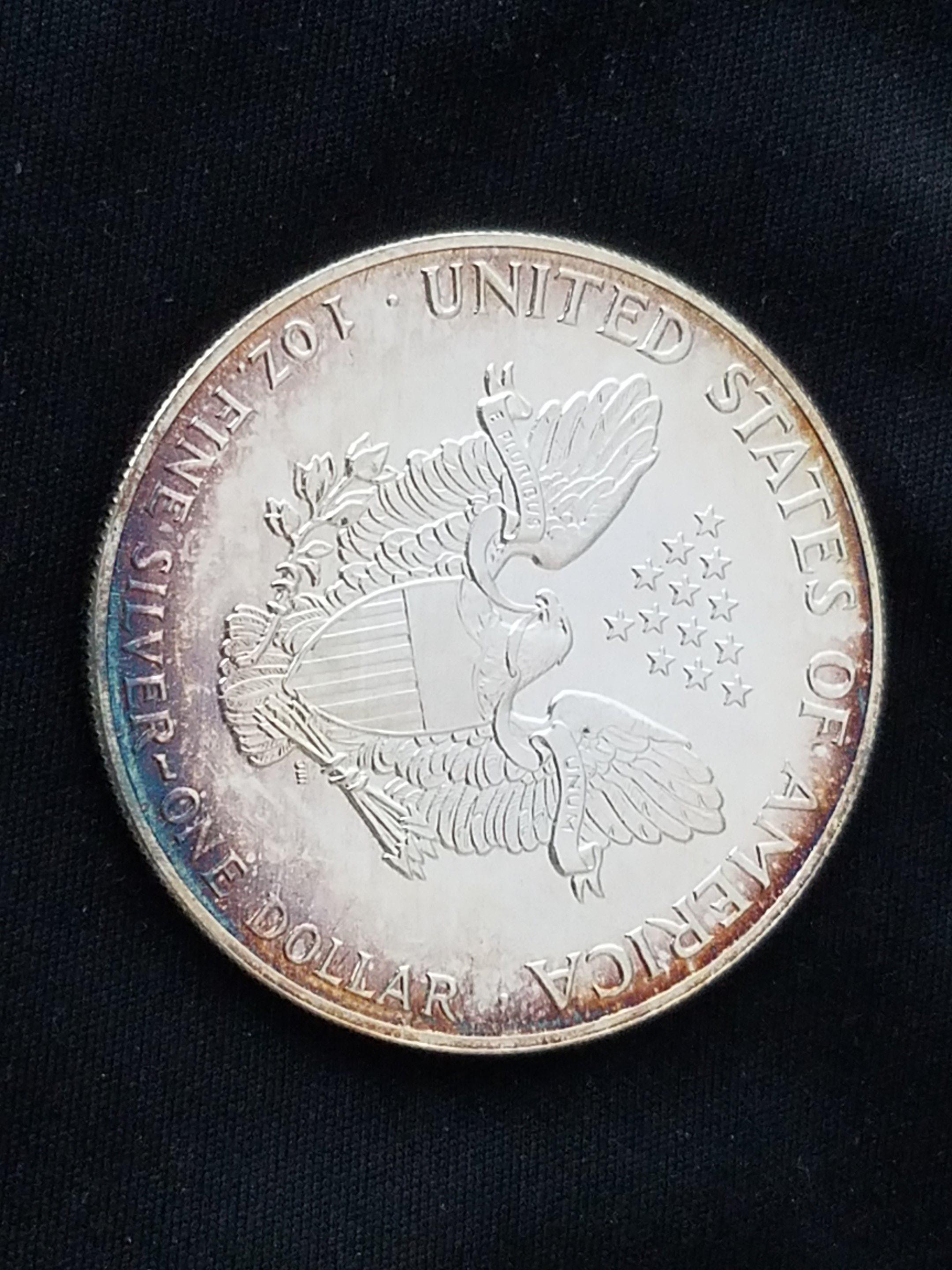 1987 1 oz. Silver American Eagle BU Nice Rainbow Toning