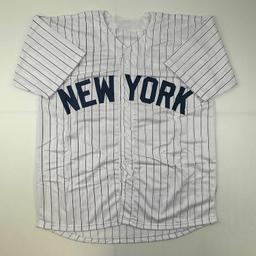 Autographed/Signed Jorge Posada New York Pinstripe Baseball Jersey Beckett BAS COA