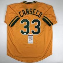 Autographed/Signed Jose Canseco Oakland Yellow Baseball Jersey JSA COA