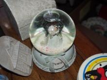 "Peace" angel snow globe