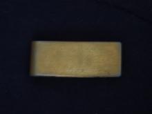 Gold colored money clip